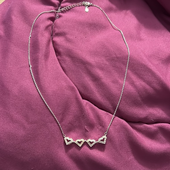 18 inch necklace. Sterling silver. Charm open up to 3 hearts. - Picture 2 of 4